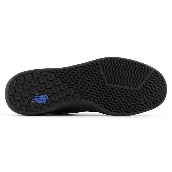 The bottom view of the NB NUMERIC 440 V2 BLACK CEMENT / BLACK skate shoe shows a geometric tread and a blue "NB" logo near the heel, ideal for everyday skaters and part of the NB NUMERIC collection.