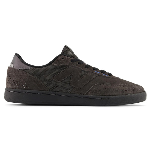 The NB NUMERIC 440 V2 BLACK CEMENT / BLACK sneaker, a black suede and mesh cupsole skate shoe by NB NUMERIC, is displayed in a side view on a white background.