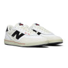 The NB NUMERIC 440 V2 in white and black features red details and cupsole construction—perfect for the everyday skater seeking style and performance.