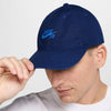 A person wears a NIKE SB CLUB HAT BLUE VOID / GAME ROYAL, featuring soft cotton twill and an adjustable back strap, slightly tilted against a plain white background.