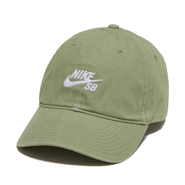 Olive green Nike SB Club Hat in cotton twill with white logo embroidered on the front, featuring an adjustable back strap, displayed against a white background.