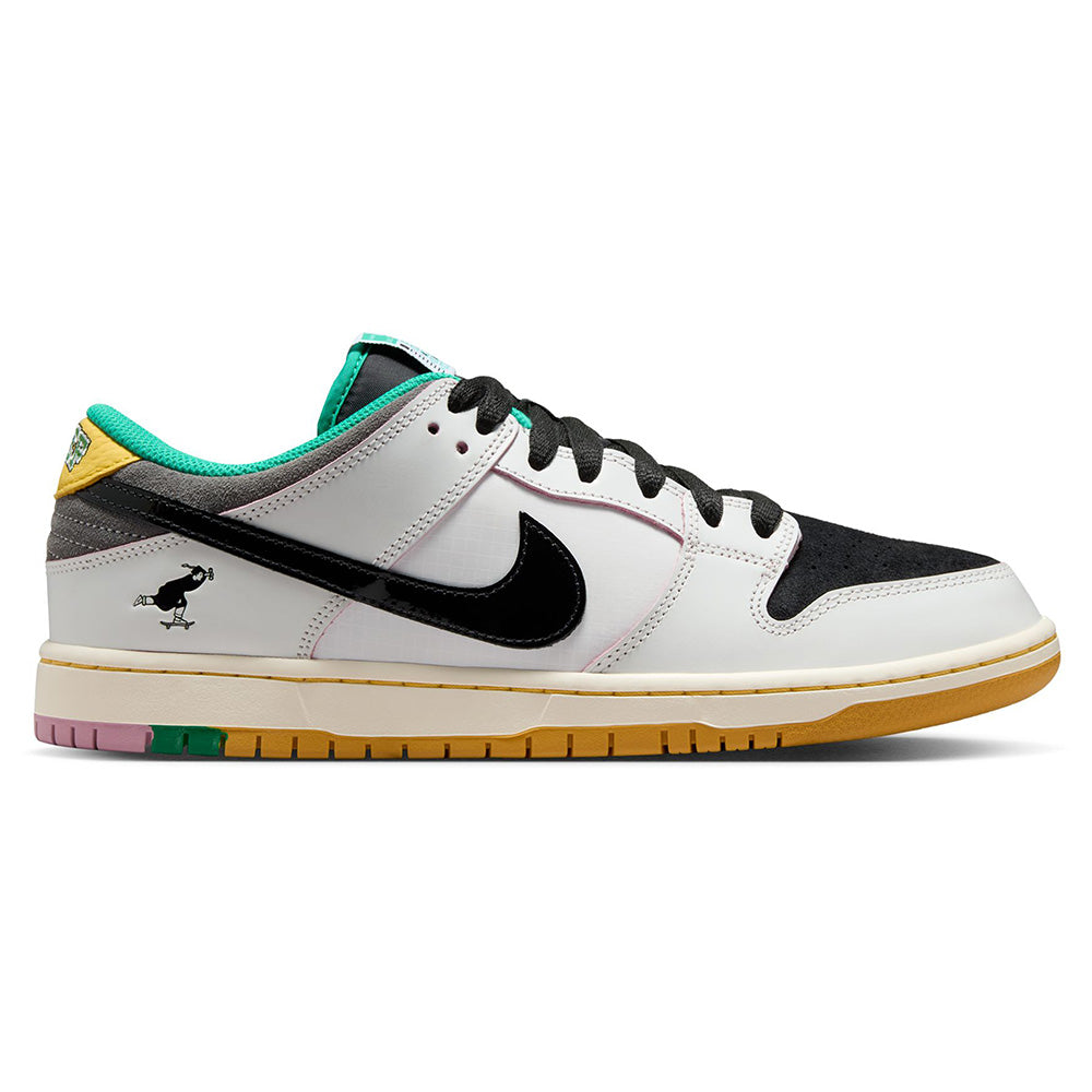 The Nike SB x CSEF Dunk Low "Raffle Winner" features a summit white and black suede upper, iron grey details, a gum sole, premium materials, and a small bird graphic on the heel.