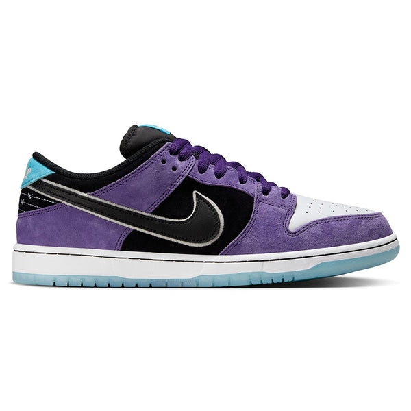 The nike SB Hayley Wilson Dunk Low Pro features premium purple suede, black and white details, a lagoon pulse (turquoise) outsole, and a black Nike swoosh.