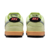 Rear view of the NIKE SB DUNK LOW PRO VERDUGO MOUNTAIN sneakers by nike, featuring light green uppers, gum soles, gray accents, and "NIKE" embroidered in pink on black heel tabs—ideal for adventures near the Verdugo Mountains.