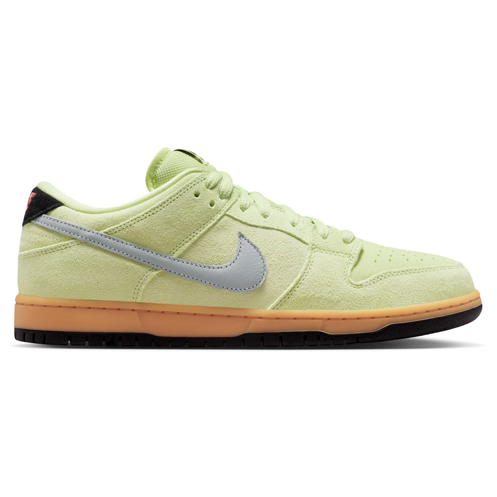 The NIKE SB DUNK LOW PRO VERDUGO MOUNTAIN features a light green upper, gray swoosh, orange midsole, black outsole and heel tab with red text—ideal for exploring the Verdugo Mountains after your mountain biking adventure.