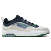 A shoe that features a sleek white, green, and navy colorway with mesh and a shiny check on the side paneling.