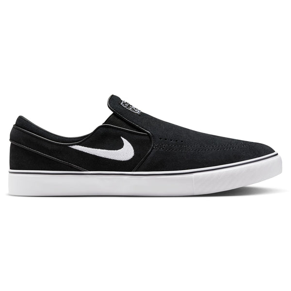 The Nike SB Janoski+ Slip is a black slip-on skate shoe with a white swoosh and sole, combining heritage basketball style and durable cupsole design.