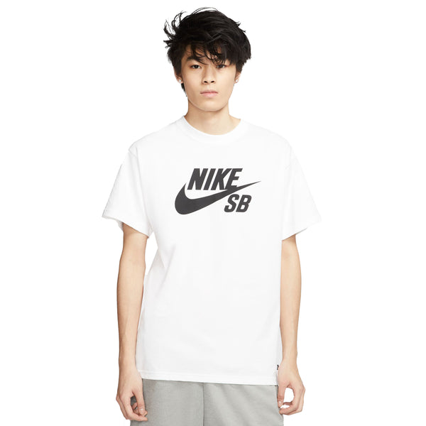 A young person wearing a white nike SB logo skate tee with an oversized logo.