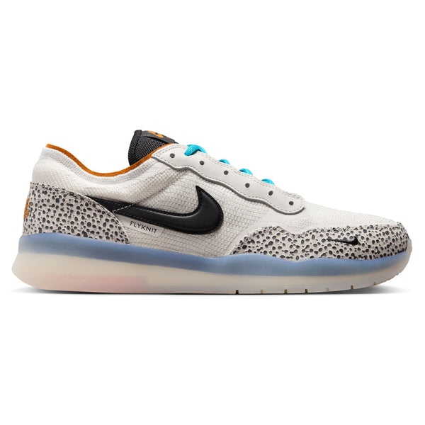 Introducing the NIKE SB PS8 ELECTRIC PHANTOM/BLACK-FOSSIL-MONARCH: a white sneaker featuring a black Nike swoosh, speckled design, turquoise laces, a translucent sole, and Air Zoom cushioning for ultimate comfort.