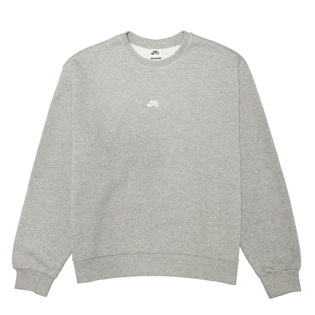 The NIKE SB ESSENTIALS LOGO FLEECE SKATE CREW GREY by Nike features a crew neck and long sleeves, crafted with brushed fleece for extra coziness. A small white Nike logo accents the chest of this stylish sweatshirt.