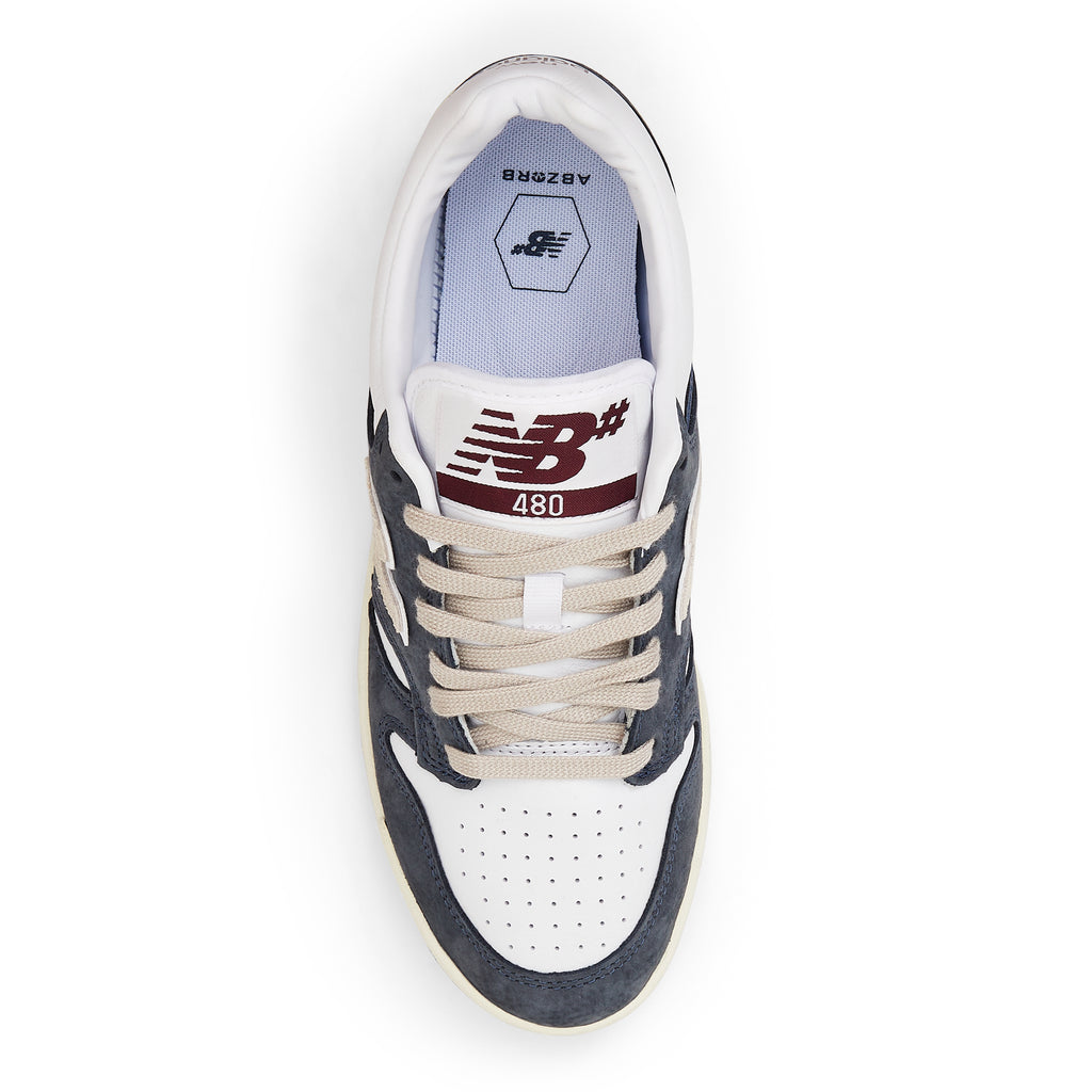 The top view of the shoe with a marron new balance logo on the tongue and the abzorb insole.