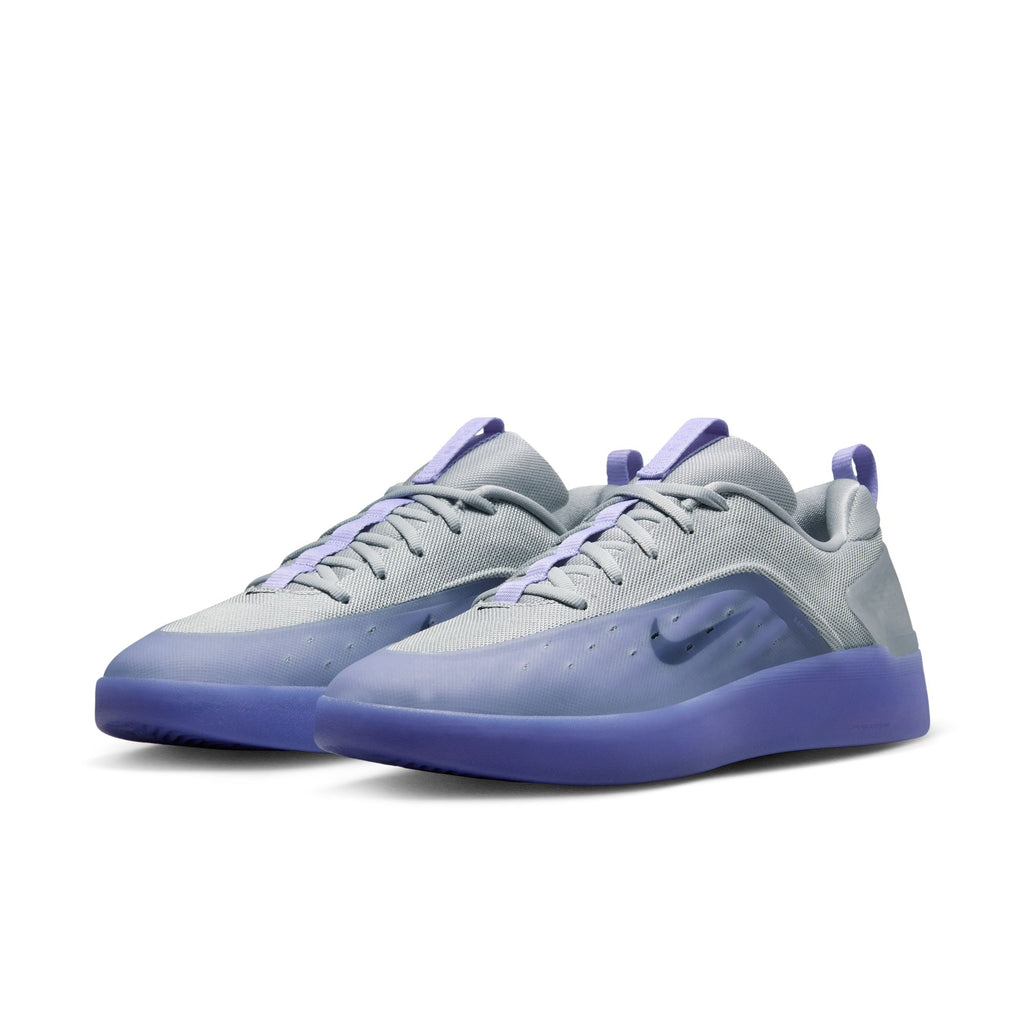 A pair of nike SB Nyjah 4 skate shoes in Light Thistle/Black-Wolf Grey-Hyper Pink, featuring responsive cushioning and purple details, displayed on a white background.