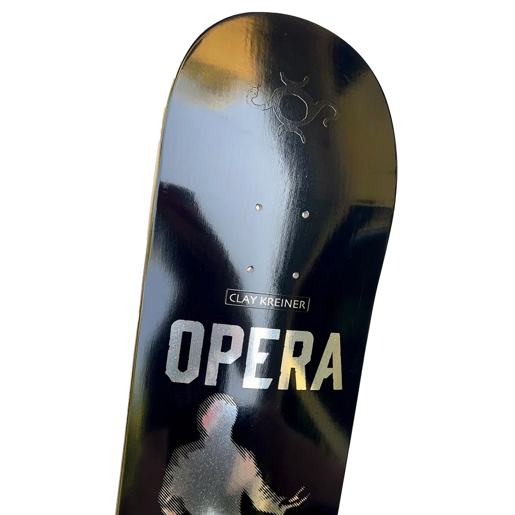 A 7-ply skateboard with the word OPERA KREINER PRAISE on it, designed by OPERA.