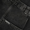 Close-up view of the pocket and belt loop area of black denim jeans, showcasing detailed stitching on the POLAR JIRO PANTS SILVER BLACK and a brand label, "POLAR" on the pocket seam.