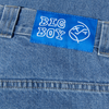 A close up of a POLAR BIG BOY MID BLUE label on a pair of blue jeans.