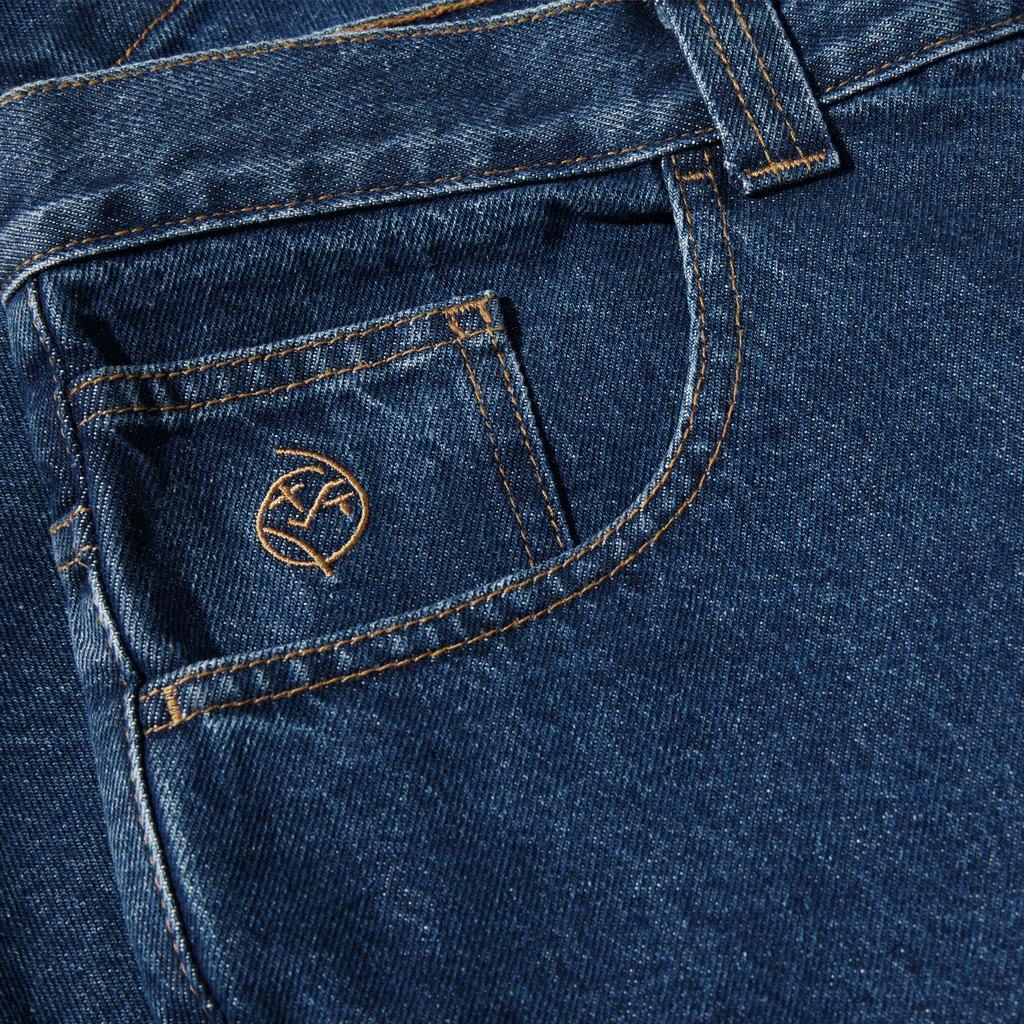 Close-up of a POLAR denim shorts pocket with stitched detail.