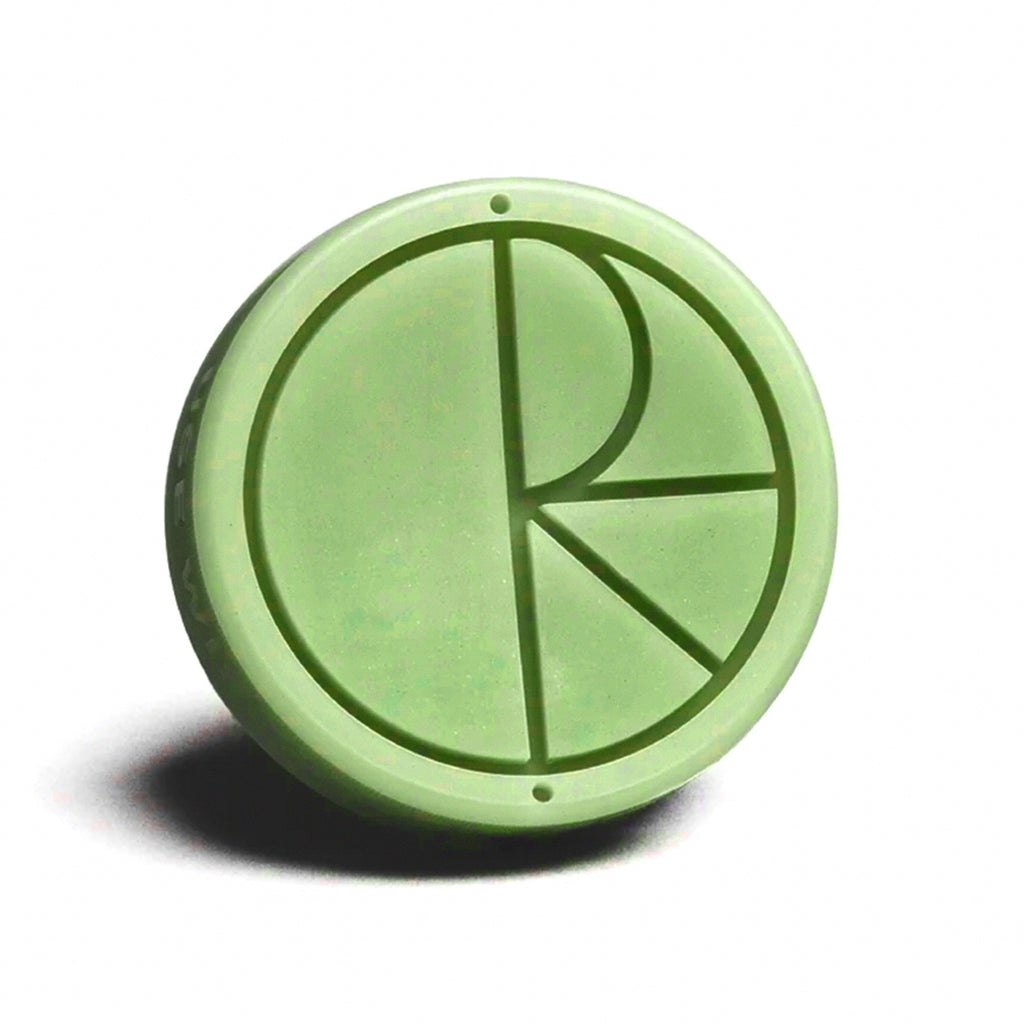 A POLAR 'USE WISELY' WAX GREEN button with the letter r on it.