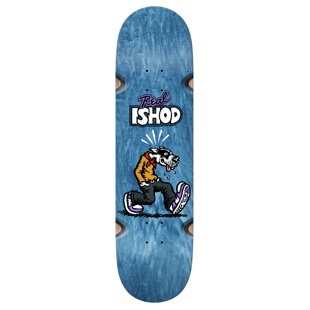 A skateboard deck with a Real Ishod Comix Wheel Wells skateboarder riding a board featuring comix style art.