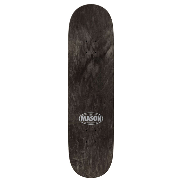 The REAL MASON COW by REAL is a black 8.25" skateboard deck with a wood grain finish and "MASON" in a white oval logo at the center.