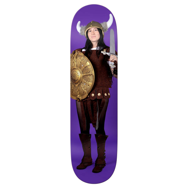 A Viking warrior with horned helmet, shield, and sword appears on the REAL NICOLE VIKING skateboard deck by REAL, set against a purple background and featuring an 8.38" width.