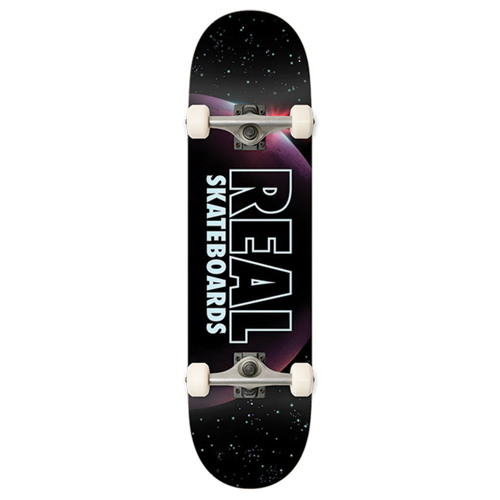 A REAL ODYSSEY COMPLETE skateboard with the words REAL skateboards on it.