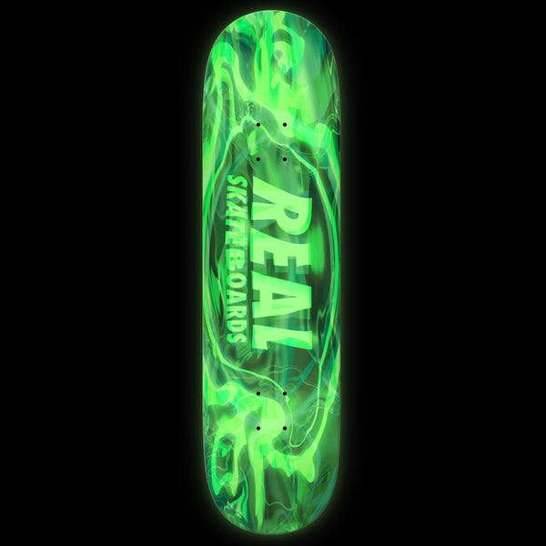 A green REAL PSYCHOACTIVE GLOW TRUE FIT skateboard.