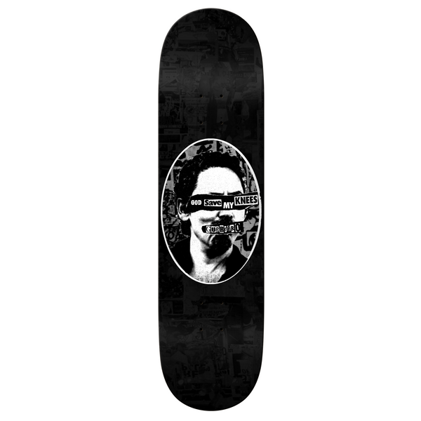 A black and white REAL skateboard with a picture of a man.