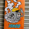 The REAL ISHOD MASCOT skateboard deck features a playful cartoon design of a tire with eyes and arms, sporting a yellow cap, in energetic chase of a spotted dog. Boasting an original shape and an 8.06" width, the word "ISHOD" adorns the bottom, combining style with a sense of fun.