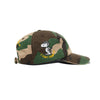 The BUTTER X PEANUTS RATS 6 PANEL CAP WASHED CAMO by Butter Goods features a washed camo design, Snoopy embroidered in aviator gear, and "I CAN'T STAND IT!" text on the side.