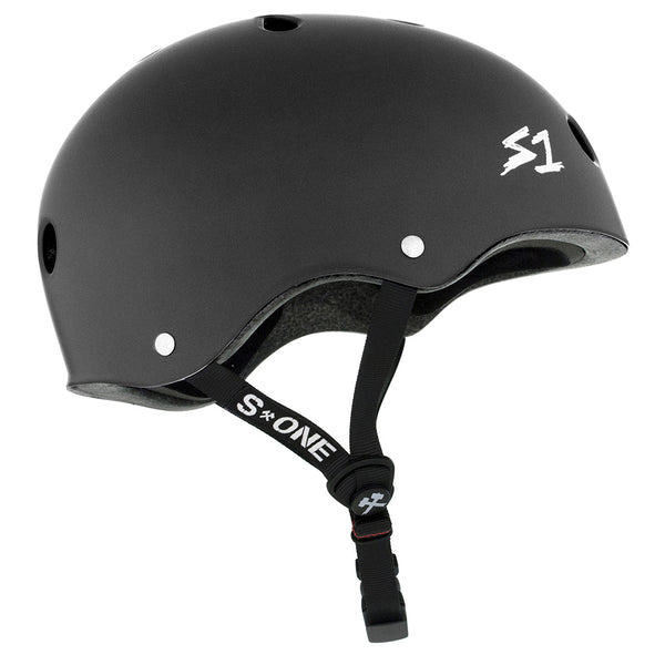 The S1 MEGA LIFER MATTE DARK GREY HELMET by S1 HELMET CO. features ventilation holes, an adjustable chin strap, and the "S1" logo—ideal for those needing a large head helmet fit.