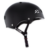 An S1 LIFER BLACK GLOSS HELMET ensuring skateboarding safety with an S1 HELMET CO. logo on it.