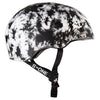 The side view of A black and white splatter/dye patterned helmet with black straps