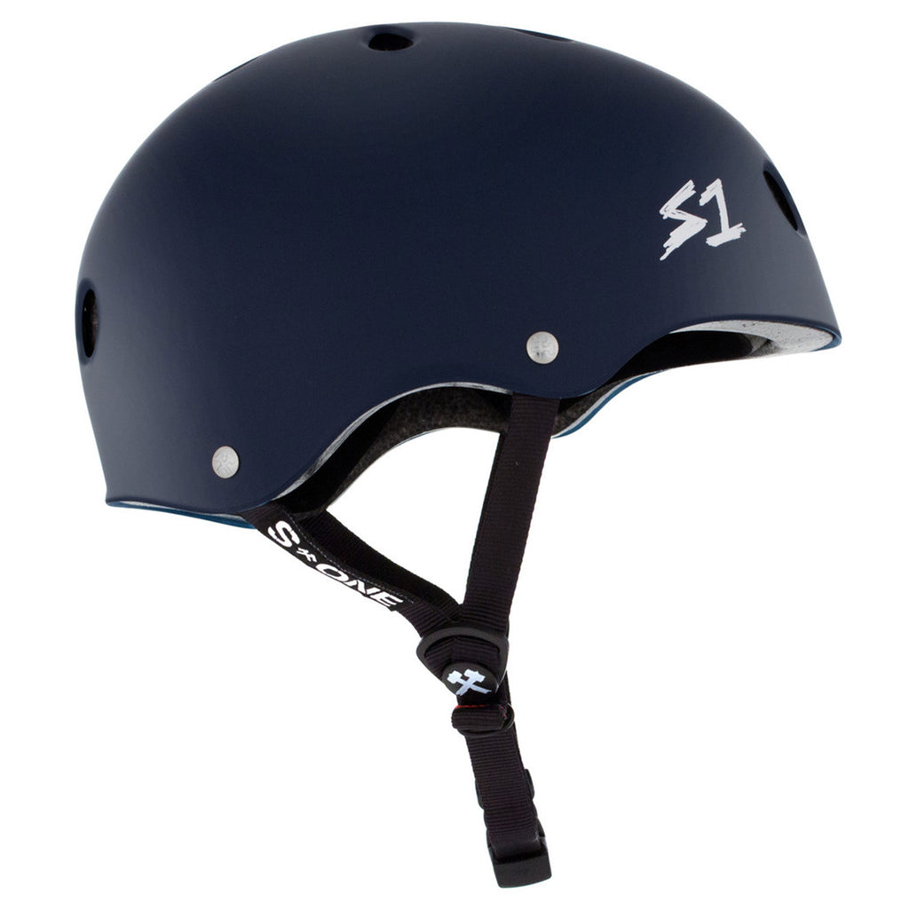 The side view of a  navy helmet with black straps and a white S1 logo on the front.