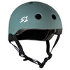 A teal green helmet with black straps and a white S1 logo on the front.