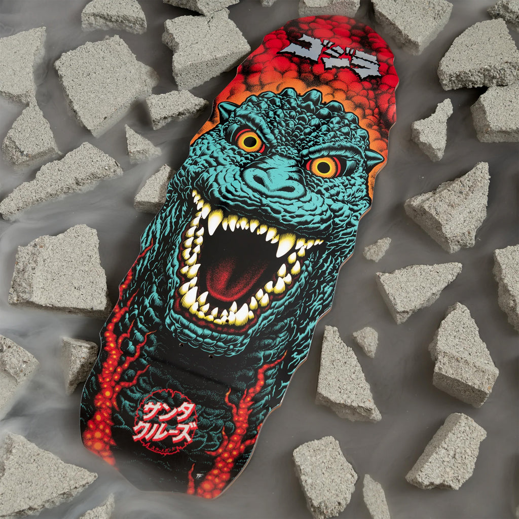 The SANTA CRUZ X GODZILLA DESTROYER skateboard deck by Santa Cruz showcases a roaring monster design inspired by Godzilla Kaiju Roskopp, amid shattered concrete pieces, and is made from sturdy North American Maple.