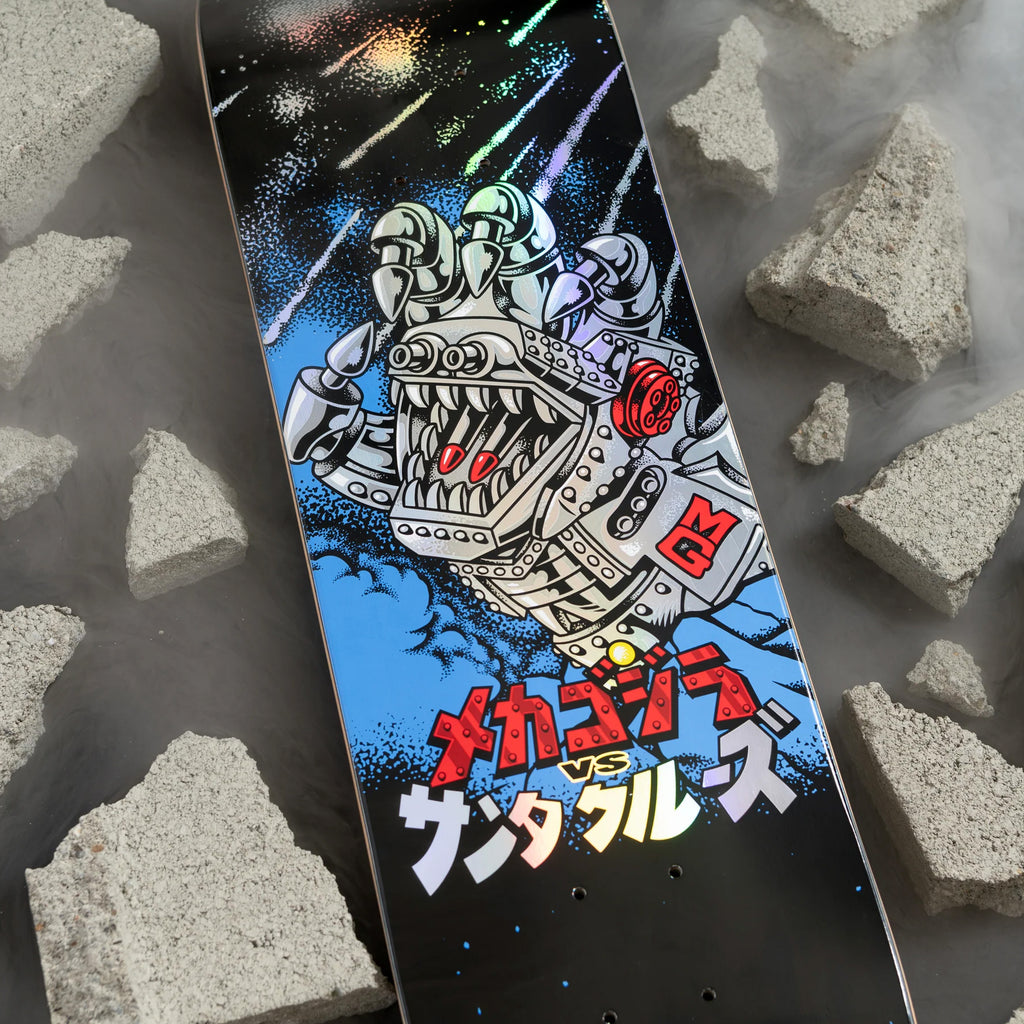 The SANTA CRUZ X GODZILLA MECHA HAND skateboard deck from SANTA CRUZ features a vibrant design with a robotic creature against gray rubble, made from durable North American Maple.