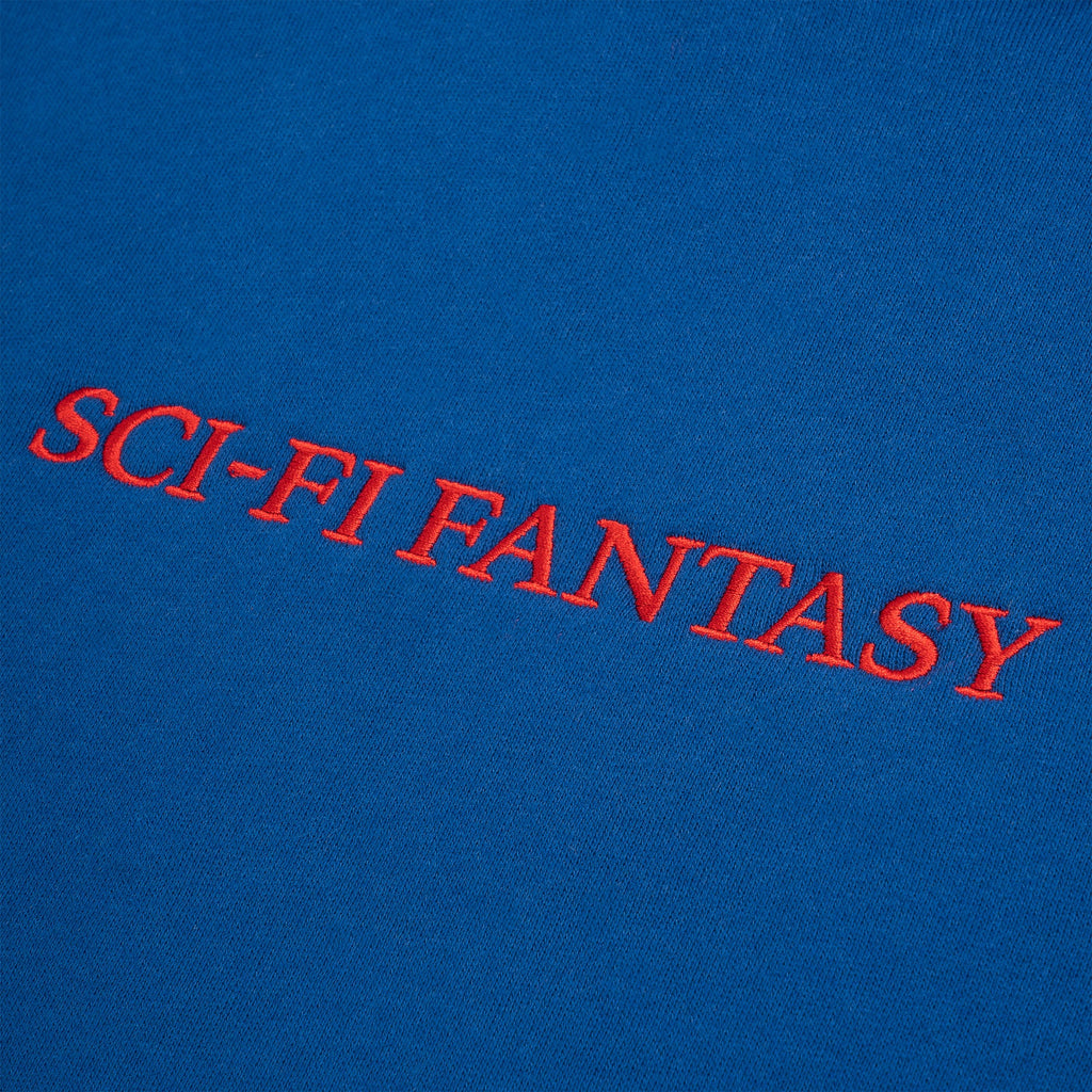 A blue SCI-FI FANTASY LOGO HOODIE ROYAL with the word sci-fi fantasy on it.