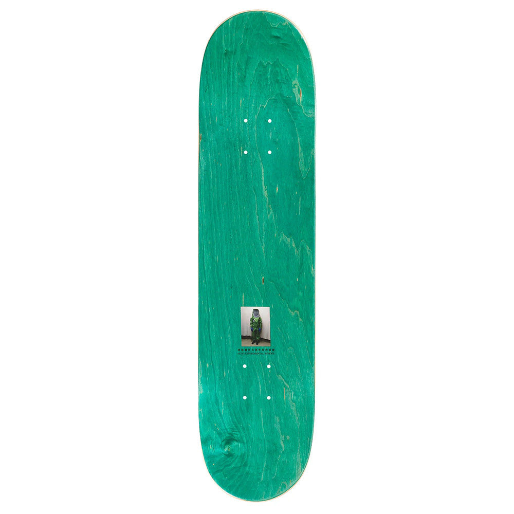 The SCI-FI FANTASY YIN YANG skateboard deck by SCI-FI FANTASY features a green wooden design with a small rectangular center graphic of a person in green attire, reflecting the brand's signature SCI-FI FANTASY style.