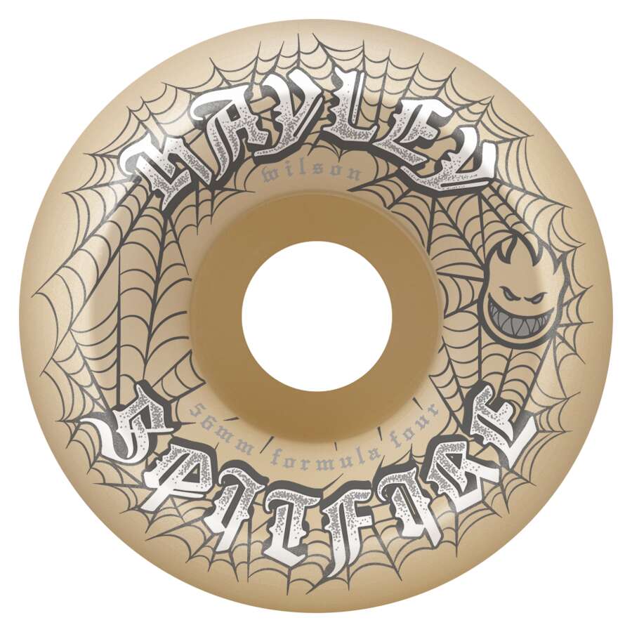 The SPITFIRE F4 HAYLEY WEBBED CONICAL FULL 99D 56MM skateboard wheel features a tan color, black spiderweb design, "SPITFIRE" and "HAYLEY" text, Formula Four conical full 99D construction, and a small flame face logo.