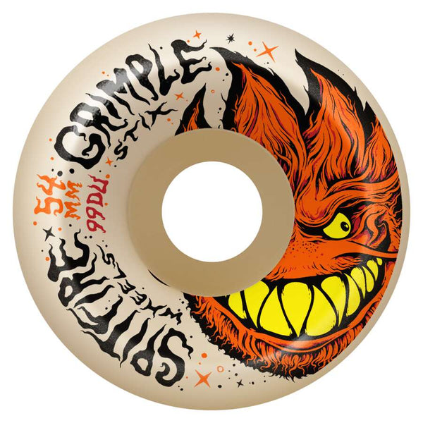 Image of a skateboard wheel with an illustrated design featuring a grinning, fiery orange face with sharp teeth and yellow eyes. Text reads "SPITFIRE X GRIMPLE STIX F4 LOCK-IN FULL 99D 54MM" and "SPITFIRE" with details 54mm, 99DU.