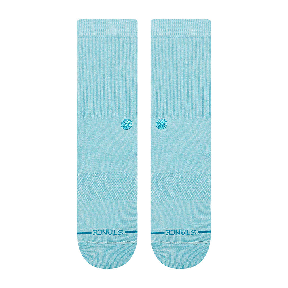 The STANCE SOCKS ICON DYED ELECTRIC BLUE LARGE are crew socks made from a soft cotton blend, featuring a small circular logo and "STANCE" print near the toes for stylish, all-day comfort.
