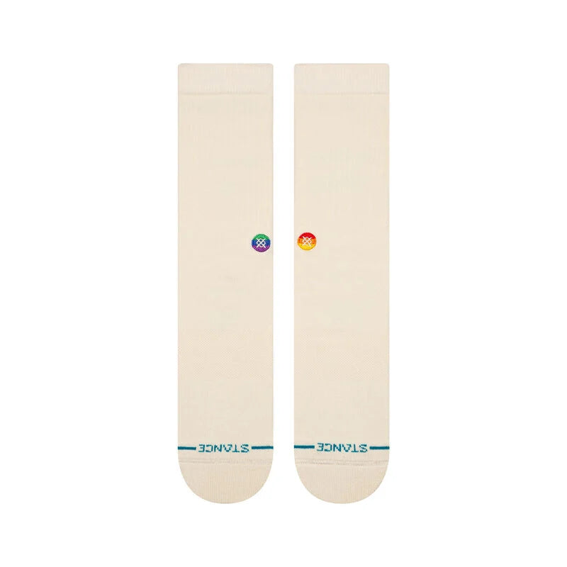 A pair of off-white **STANCE SOCKS COTTON CREW ENCIRCLE WHITE LARGE** with "STANCE" written near the toes, adorned with small multicolored logos near the middle, in a stylish ICON ICE BLUE.