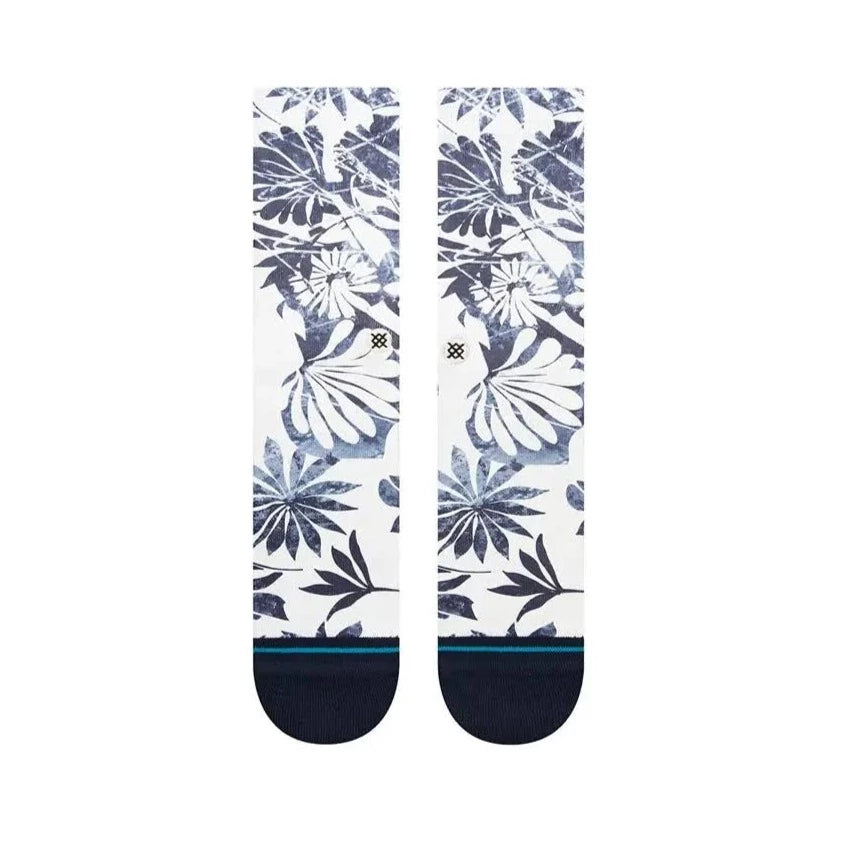 A pair of STANCE SOCKS WAIKALOA NAVY LARGE with blue and white flowers on them.
