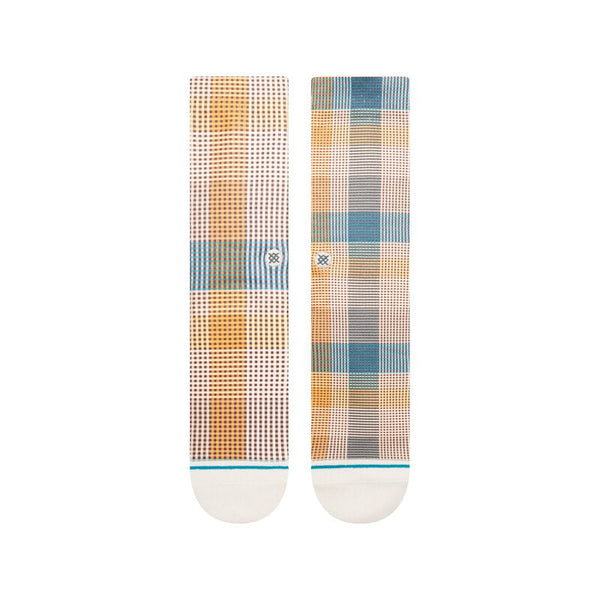 A pair of STANCE SOCKS TARTAN CREW TEAL LARGE with a plaid pattern.