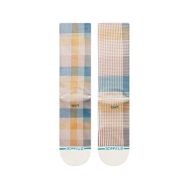 A pair of STANCE SOCKS TARTAN CREW TEAL LARGE with a plaid pattern.