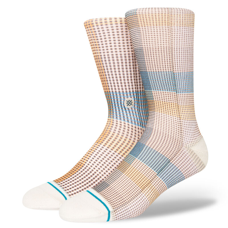 A pair of STANCE SOCKS TARTAN CREW TEAL LARGE with a checkered pattern.