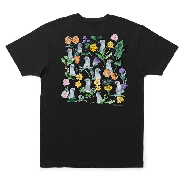 A black cotton blend STANCE X TODD FRANCIS PIGEON STREET TEE BLACK with a colorful floral and bird print on the back, perfect for fans of "Stranger Things.