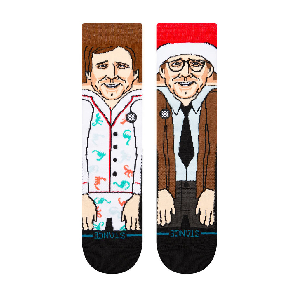 Embrace the holiday spirit with the STANCE X CHRISTMAS VACATION GRISWOLD CREW MULTI LARGE socks. These crew socks from STANCE feature cartoon characters reminiscent of the Griswold's Christmas Vacation. One character wears a festive white suit, while another is styled in a brown suit with a Santa hat, making them an ideal choice for adding a playful touch to any celebration!