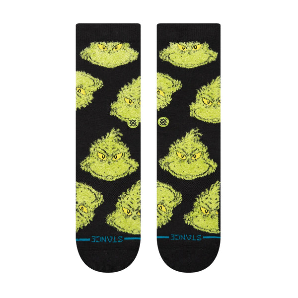 Introducing the STANCE X THE GRINCH MEAN ONE BLACK LARGE socks by STANCE: These black large socks feature multiple green Grinch faces with different expressions. A white logo and blue accents near the toe area complete this playful and stylish design. Perfect for adding a hint of fun to your outfit, these socks bring The Grinch right to your feet!