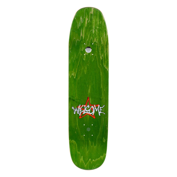 A WELCOME skateboard with a red logo on it.